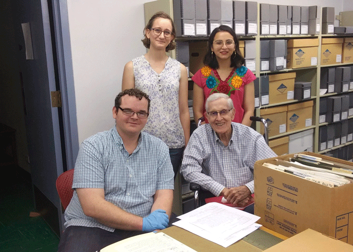 Three NMSU Student interns pose with J. Paul Taylor